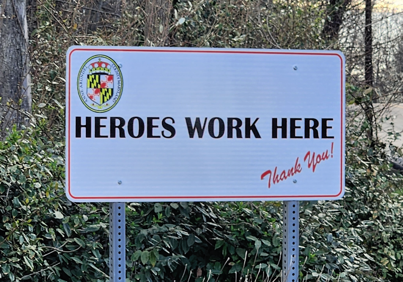 Heroes Work Here sign