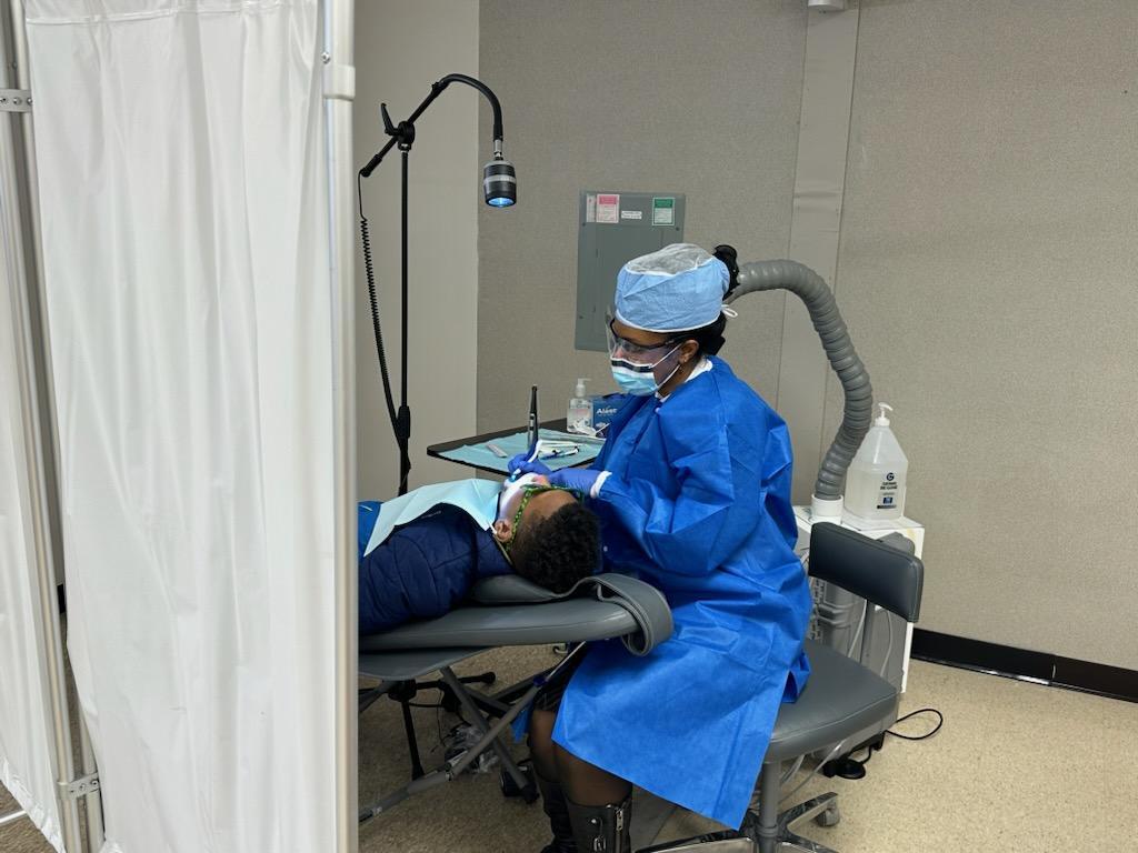Dental Technician working on patient 
