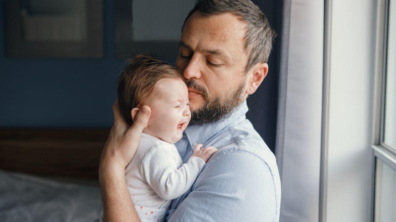 Man holding a baby