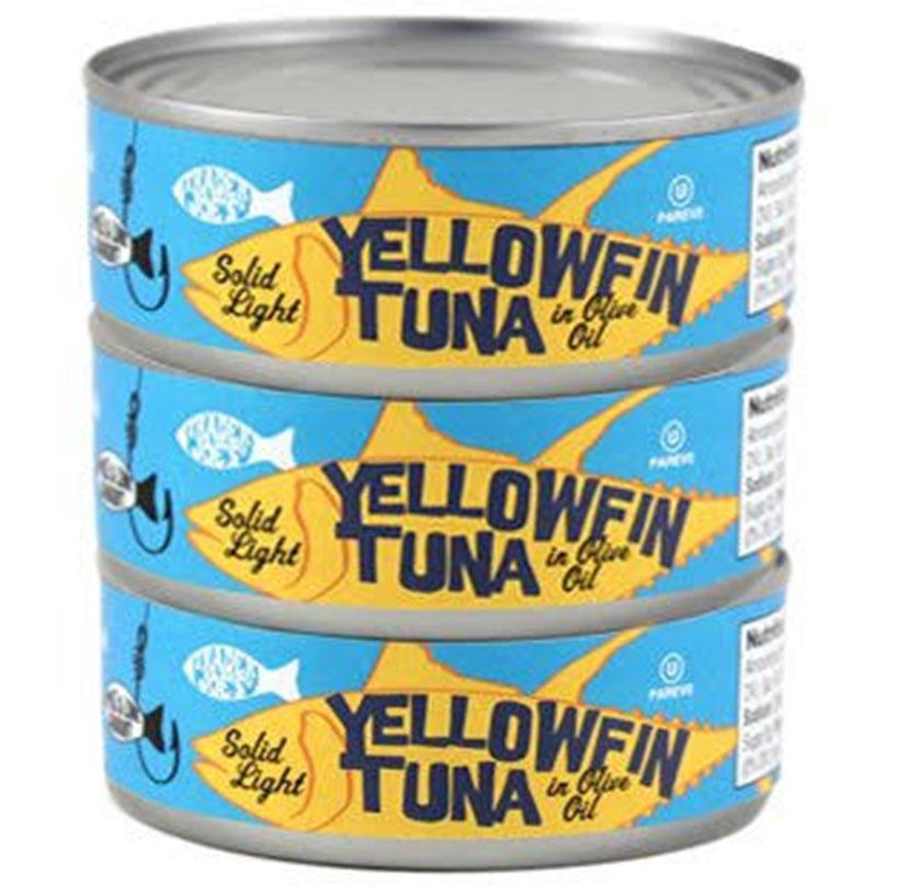 Cans of Yellowfin Tuna stacked on top of one another